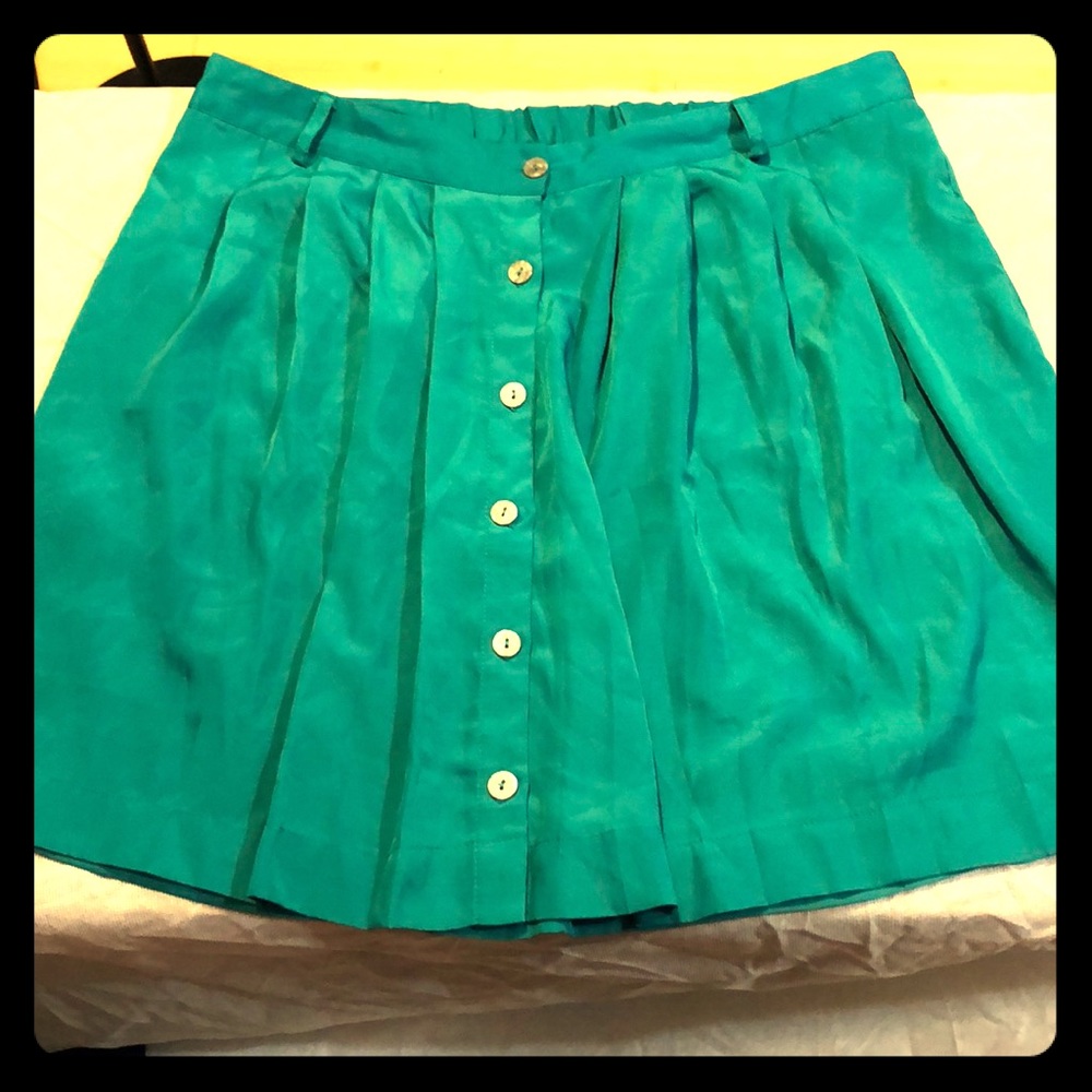 Green button down skirt.